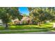 Brick house front view, landscaping, and driveway at 1434 Hidden Meadow Way, Apopka, FL 32712