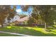 Brick house front view, landscaping, and driveway at 1434 Hidden Meadow Way, Apopka, FL 32712