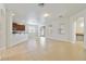 Open living room and kitchen area with tile floors at 8039 Northlake Pkwy, Orlando, FL 32827