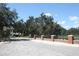 Brick wall and paved road at community entrance at 8039 Northlake Pkwy, Orlando, FL 32827