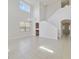 Spacious dining room with high ceilings and tile floors at 8039 Northlake Pkwy, Orlando, FL 32827