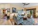 Spacious living area with hardwood floors and a view to an office at 2366 Prairie Dunes, Clermont, FL 34711
