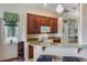 Modern kitchen with granite counters and breakfast bar at 2366 Prairie Dunes, Clermont, FL 34711