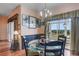 Bright dining area with glass table and view to backyard at 2366 Prairie Dunes, Clermont, FL 34711