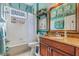 Bathroom with granite vanity and decorative accents at 2366 Prairie Dunes, Clermont, FL 34711