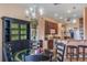 Charming dining area with a glass-top table and black chairs at 2366 Prairie Dunes, Clermont, FL 34711