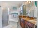 Elegant bathroom with granite countertops and corner tub at 2366 Prairie Dunes, Clermont, FL 34711