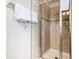 Clean bathroom with a shower and glass enclosure at 8967 California Palm Rd, Kissimmee, FL 34747