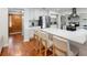 Updated kitchen with stainless steel appliances and quartz countertops at 115 Marcy Blvd, Longwood, FL 32750