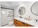 Modern bathroom with double vanity and walk-in shower at 115 Marcy Blvd, Longwood, FL 32750