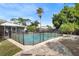 Sparkling clean pool with a safety fence at 115 Marcy Blvd, Longwood, FL 32750