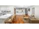 Open concept living area with built-in shelving and hardwood floors at 115 Marcy Blvd, Longwood, FL 32750