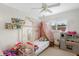 bedroom with unique house bed and toys at 115 Marcy Blvd, Longwood, FL 32750