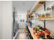 Well-stocked pantry with ample shelving for storage at 115 Marcy Blvd, Longwood, FL 32750