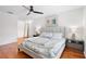 Bright bedroom with hardwood floors and a ceiling fan at 115 Marcy Blvd, Longwood, FL 32750