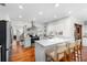 Modern kitchen featuring a large island and hardwood floors at 115 Marcy Blvd, Longwood, FL 32750