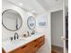 Modern bathroom with double vanity and large mirrors at 115 Marcy Blvd, Longwood, FL 32750