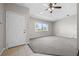 Living room with gray carpet and large window at 2009 Lakeshore Blvd, Saint Cloud, FL 34769