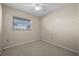 Simple bedroom with window and neutral decor at 2009 Lakeshore Blvd, Saint Cloud, FL 34769