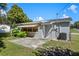 Single story house with a patio and fenced backyard at 2009 Lakeshore Blvd, Saint Cloud, FL 34769