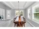 Elegant dining room features a chandelier and hardwood floors at 1401 Oil Lamp Cv, Lake Mary, FL 32746