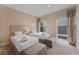 Two twin beds, with an en-suite bathroom, and balcony access at 3175 Brasilia Ave, Kissimmee, FL 34747