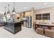 Modern kitchen with stainless steel appliances and island at 3175 Brasilia Ave, Kissimmee, FL 34747