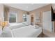 Two twin beds, private access to a small bathroom and balcony access at 3175 Brasilia Ave, Kissimmee, FL 34747