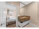 Guest bathroom with granite countertop and view of bedroom at 3175 Brasilia Ave, Kissimmee, FL 34747