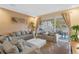 Spacious living room with access to a private patio at 3175 Brasilia Ave, Kissimmee, FL 34747