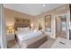 Spacious bedroom with king bed and ensuite bathroom at 3175 Brasilia Ave, Kissimmee, FL 34747