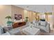 Living area with modern furniture and large TV at 3175 Brasilia Ave, Kissimmee, FL 34747