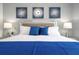Main bedroom with king-size bed and stylish decor at 2709 Scrapbook St, Kissimmee, FL 34746