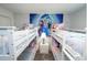 Four bunk beds in a spacious bedroom at 2709 Scrapbook St, Kissimmee, FL 34746