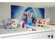 Bunk beds in a bedroom with Frozen mural at 2709 Scrapbook St, Kissimmee, FL 34746