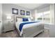 Spacious bedroom with king-size bed and en-suite bathroom at 2709 Scrapbook St, Kissimmee, FL 34746