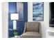 Cozy living area with comfortable armchair and side table at 2709 Scrapbook St, Kissimmee, FL 34746