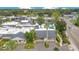 An aerial shot showcasing a community of homes, including a pool and surrounding landscape at 899 Jonathan Way # 899, Altamonte Springs, FL 32701