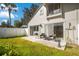 Private backyard with patio, grill, and grassy area at 899 Jonathan Way # 899, Altamonte Springs, FL 32701