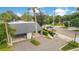 Aerial view of a complex of homes with a pool and surrounding landscape at 899 Jonathan Way # 899, Altamonte Springs, FL 32701