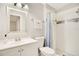 Modern bathroom with white vanity and tiled shower at 899 Jonathan Way # 899, Altamonte Springs, FL 32701