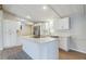 Updated kitchen featuring a large island and stainless steel appliances at 126 Maple Dr, Debary, FL 32713