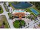 Resort-style pool, tennis courts, and clubhouse at 1646 Cumin Dr, Poinciana, FL 34759