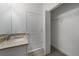Bathroom with granite countertop and a closet at 1646 Cumin Dr, Poinciana, FL 34759
