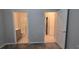 Clean bathroom with gray vanity and a shower at 1007 Theodore St, Davenport, FL 33837