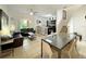 Open living and dining area with a contemporary design at 319 Verona Ave, Davenport, FL 33897