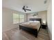 Spacious bedroom with king-size bed and plenty of natural light at 319 Verona Ave, Davenport, FL 33897