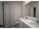 Double vanity bathroom with white cabinets and mirror at 1648 Andover Ridge Dr, Deland, FL 32720