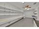 Bright workshop with extensive built-in shelving at 381 S Moss Rd, Winter Springs, FL 32708