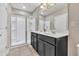 Double vanity bathroom with a large walk-in shower at 4738 Terrasonesta Dr, Davenport, FL 33837